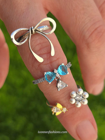 .925 sterling silver bow and pearl flower rings
