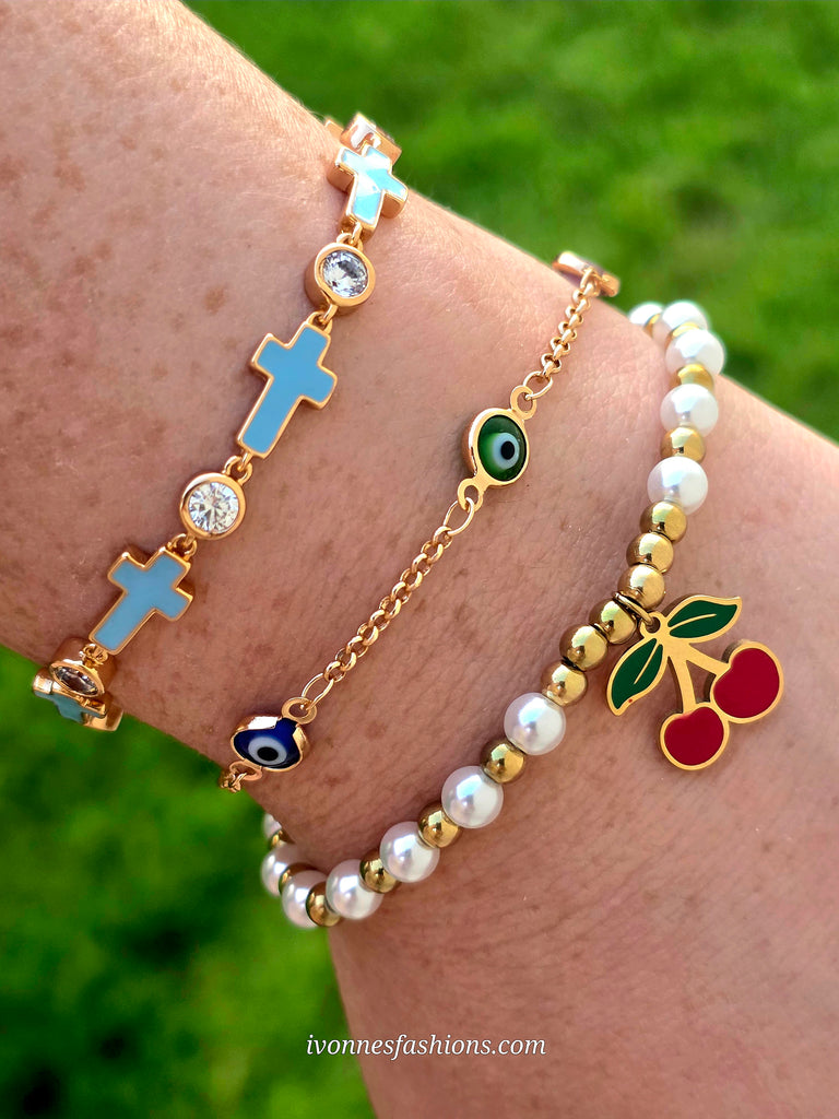 18k gold plated cross, evil eye and cherry bracelets