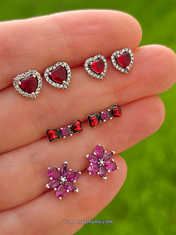 .925 Sterling silver heart, bow and flower earrings