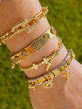 18k gold plated Lady of Guadalupe, San Judas and clover bracelets