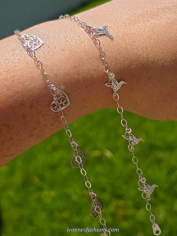 .925 Sterling silver heart and hummingbird bracelets