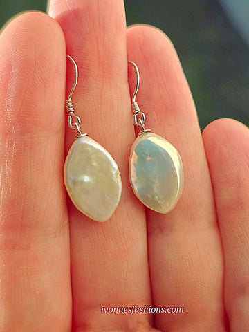 .925 Sterling silver and natural freshwater pearl dangling earrings