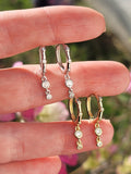 .925 Sterling silver and CZ dangling hoop earrings